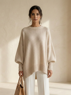 Suéter poncho oversize de punto ELENA de Veyro Madrid, color gris, con textura suave y diseño amplio para mujer.