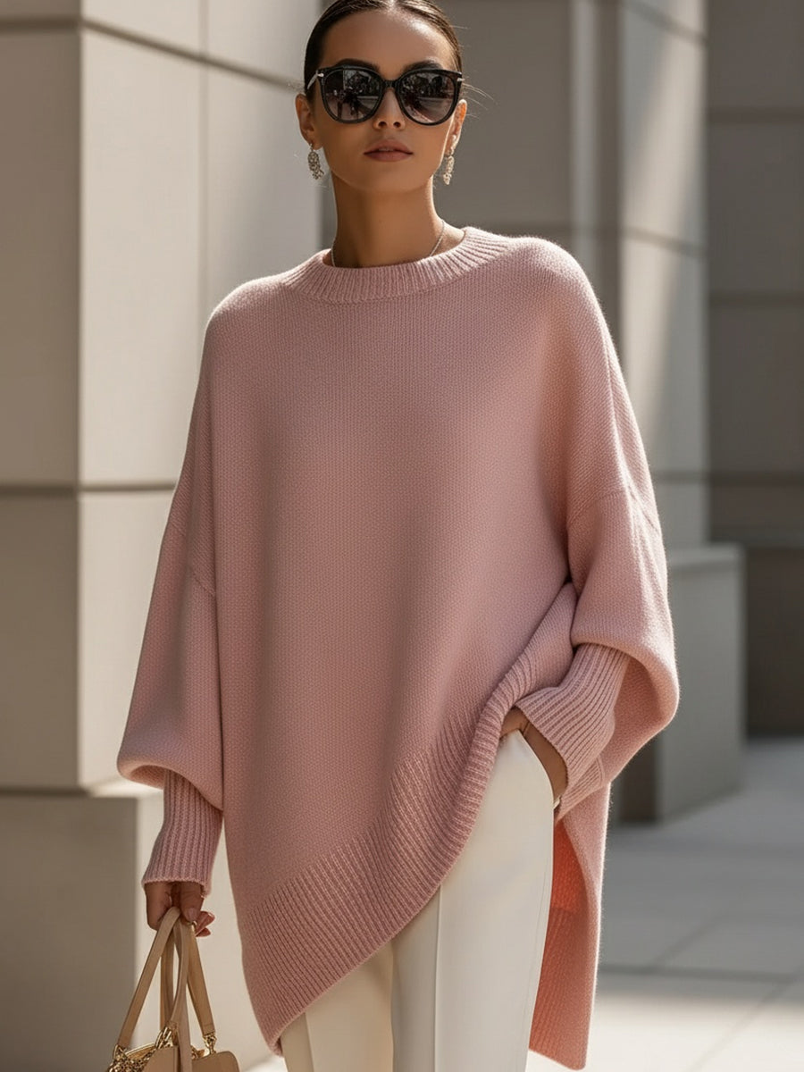 Suéter poncho oversize de punto Elena de Veyro Madrid, en color neutro, con textura suave y estilo cómodo para mujer.