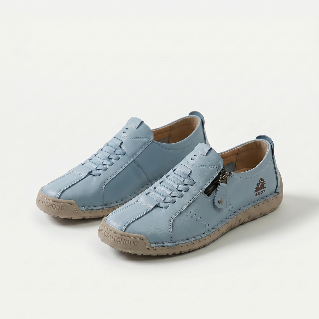 Zapatillas elegantes Veyro Madrid Nila con cierre práctico y diseño moderno en color neutro, ideales para comodidad y estilo.