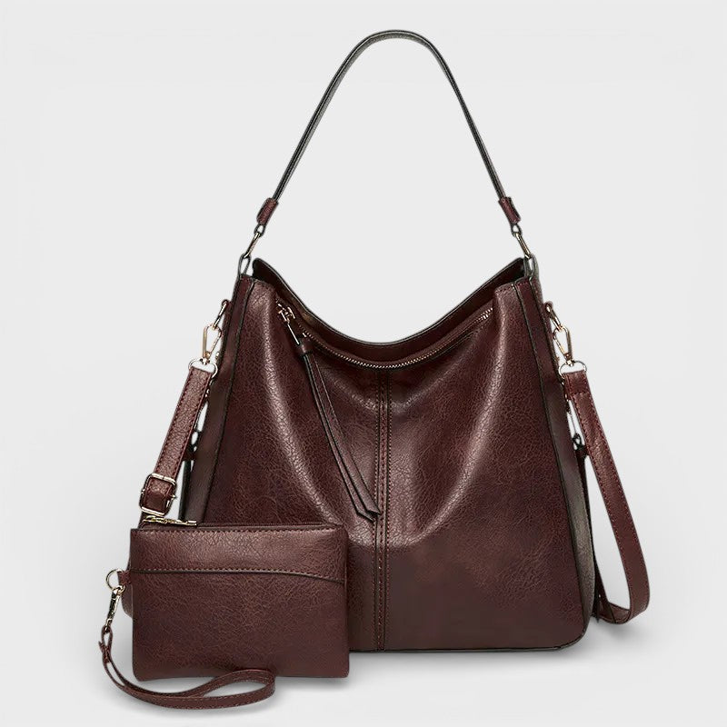 Bolso de piel vintage Paula de Veyro Madrid, bolso de mano con detalles elegantes y acabado en cuero envejecido.