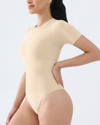Body moldeador de cuello redondo con soporte firme de manga corta de la marca Veyro Madrid, ajuste cómodo y firme.