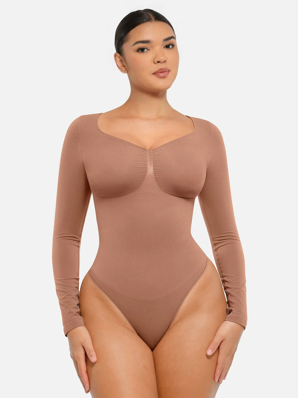 Body suit moldeador de manga larga de Veyro Madrid, ajustado y cómodo, en color negro, mostrado en primer plano.
