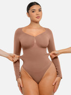 Body suit moldeador de manga larga Veyro Madrid, en color negro, con detalles ajustados y textura suave visible en la imagen.