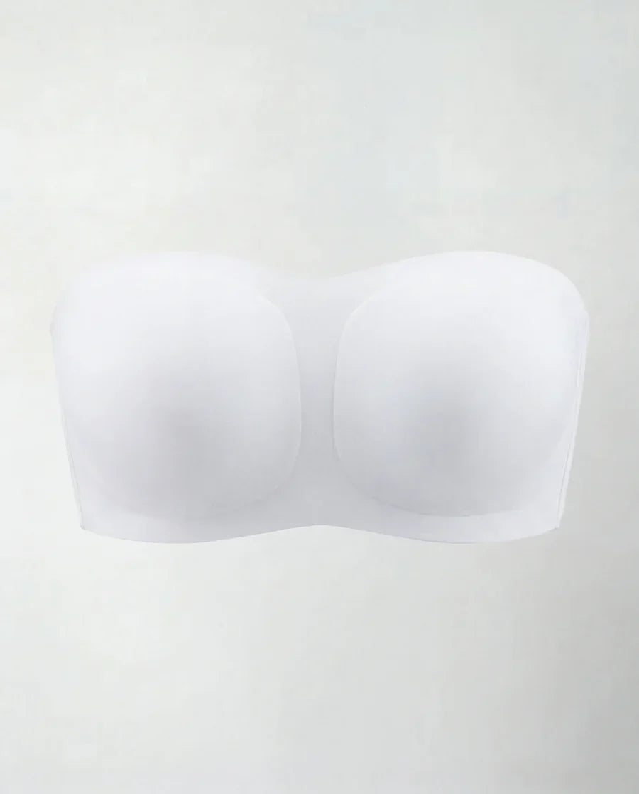 Sujetador invisible sin tirantes Veyro Moda en color blanco, sin costuras y diseñado para usar con ropa sin hombros.