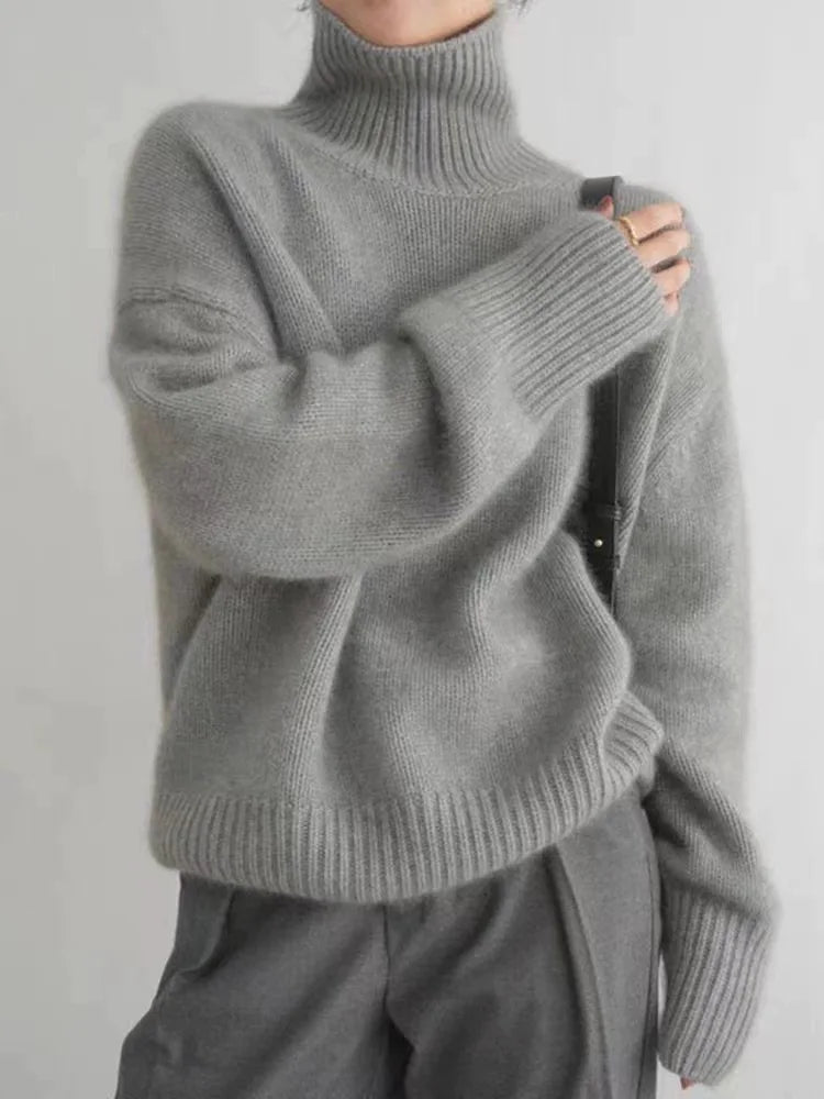 Suéter de cuello alto Noemi de Veyro Madrid, de lana pura, con diseño de punto grueso, ideal para otoño e invierno.