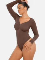 Body suit moldeador de manga larga Veyro Madrid, sin costuras, con control de abdomen y diseño ajustado, en color negro.