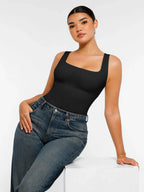 Body de canalé con escote cuadrado de Veyro Madrid, prenda ajustada y sin costuras en color negro, para moldear la figura.
