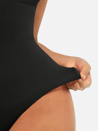 Body suit moldeador con espalda baja de Veyro Madrid, ajustado y cómodo, en color negro, para control y estilización del cuerpo.