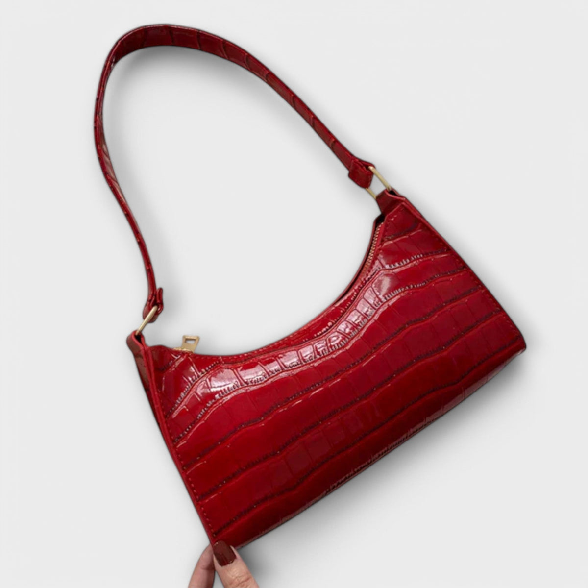 Bolso de cuero Silvina de Veyro Madrid con asa y cierre, en color marrón, con detalles elegantes y acabado de alta calidad.