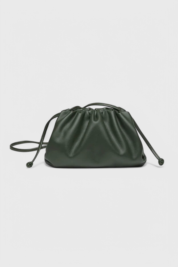 Bolso cruzado Dalila de Veyro Madrid en color beige con detalles en negro, diseñado para llevar en el hombro o cruzado.