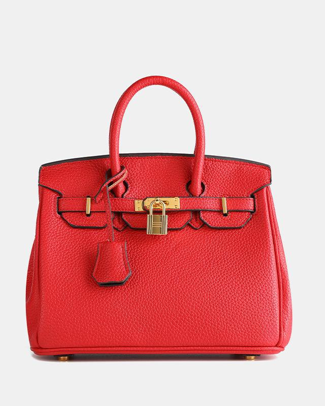 Bolso de cuero MILA de Veyro Madrid, con diseño elegante y detalles en cuero genuino, en color marrón.