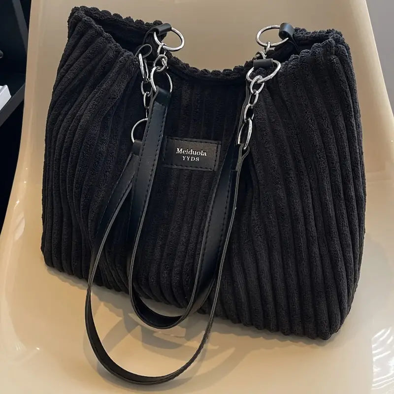 Bolso de pana Veyro Madrid con asas dobles, diseño elegante y resistente en color marrón con detalles de costura.