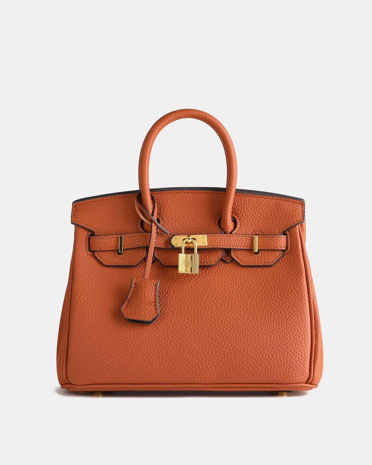 Bolso de cuero MILA de Veyro Madrid, con diseño elegante y asa de mano, en color marrón.