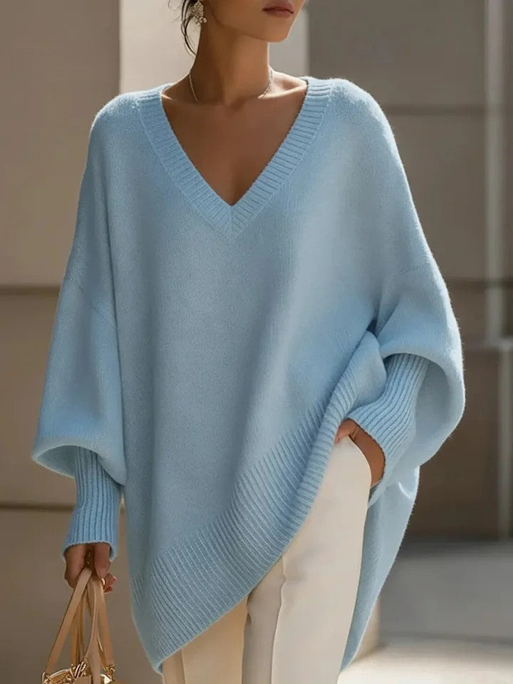 Suéter de punto Veyro Madrid con cuello pico, diseño elegante y cómodo en color neutro, ideal para estilos casuales y formales
