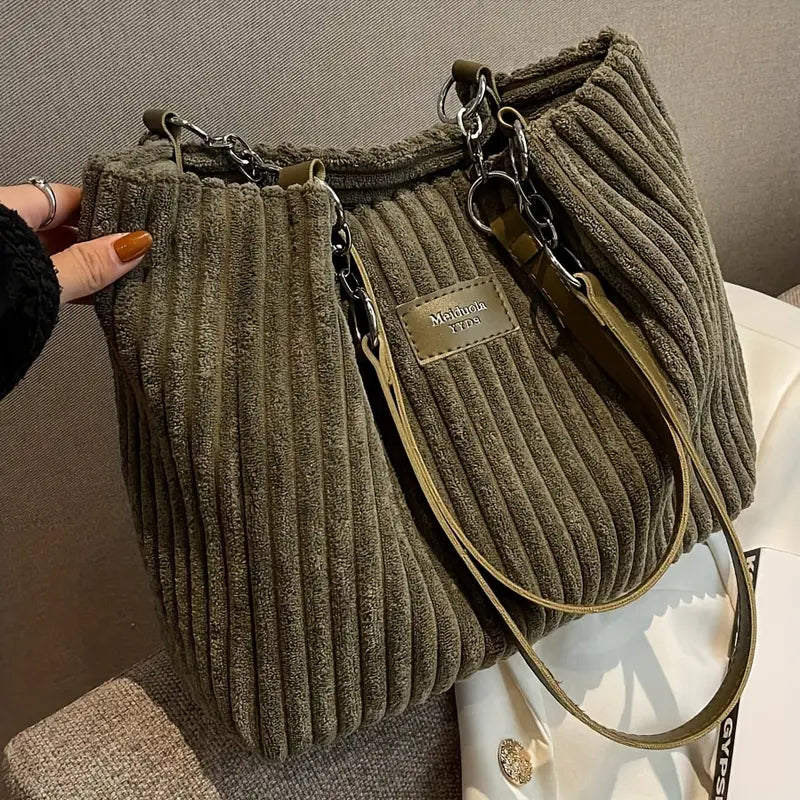 Bolso de pana Veyro Madrid con asas dobles, diseño en tonos marrón, ideal para uso casual y elegante.