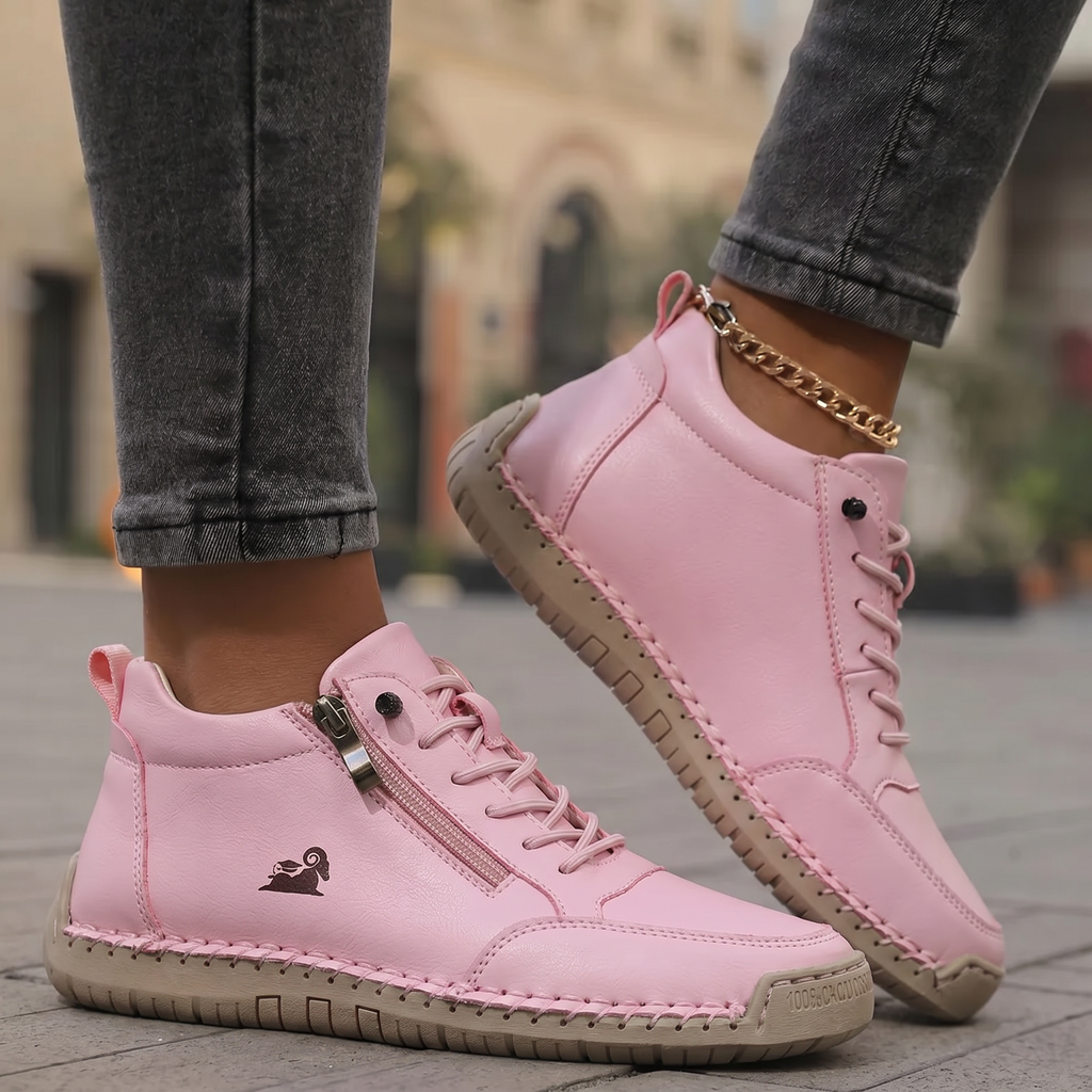 Zapatillas ortopédicas Veyro Madrid Mila en color rosa con cremalleras, diseño cómodo y adaptable para el bienestar del pie.