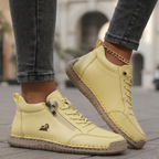 Zapatillas ortopédicas Veyro Madrid Mila con cremallera en color amarillo, diseño cómodo y soporte para los pies.